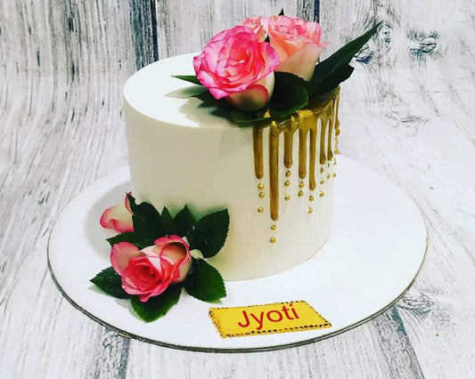 White and Gold theme cake with roses